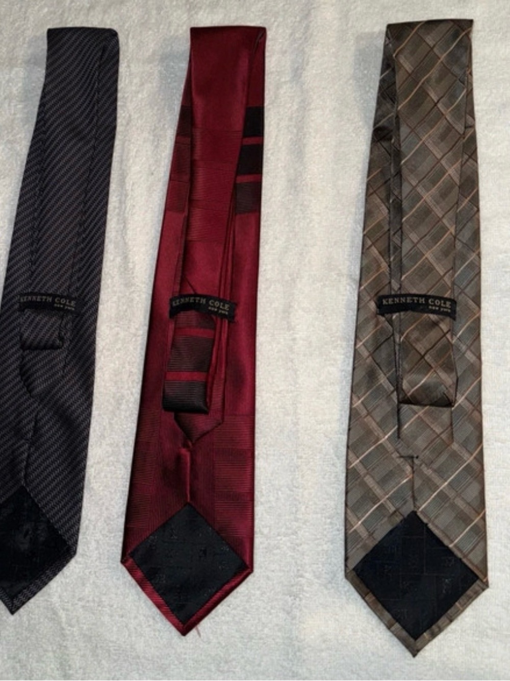 Kenneth Cole Three-Pack Ties in Black, Burgundy, Brown Plaid